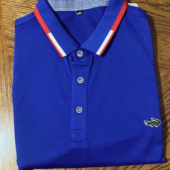 Other - Blue blue polo shirt with red/white stripe..